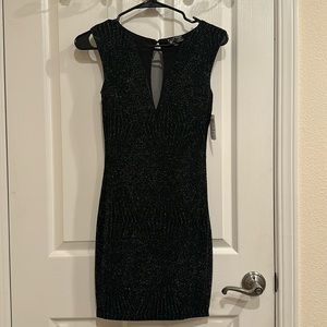 Sparkly black mesh cocktail dress.